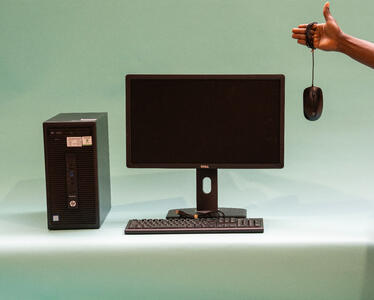A secondhand set-up with a PC, a screen and computer mouse.