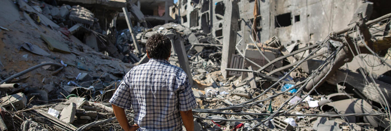 Gaza man watching distructions