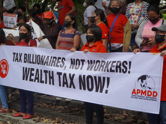 Tax billionaires, not workers!